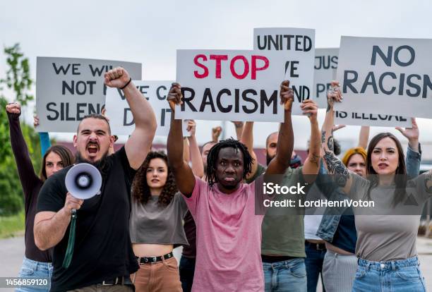 People Protesting Against Racism Stock Photo - Download Image Now - Racism, Activist, Adult