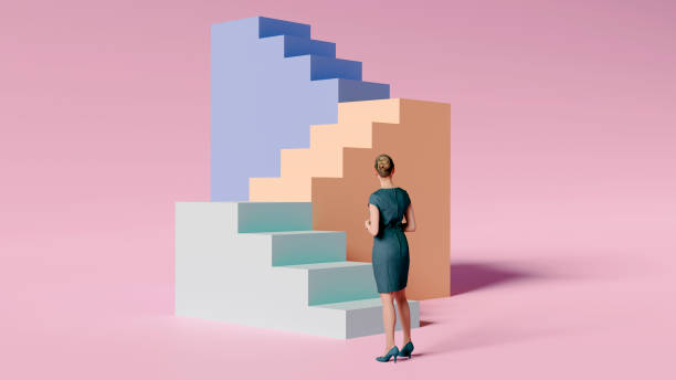 Conceptual image of entrepreneur making the right strategy Woman stands in front of a staircase in different colors.  She is about to walk up the stairs. Concept of standing in front of a challenge and finding the right solution and courage to move on. ladder of success stock pictures, royalty-free photos & images