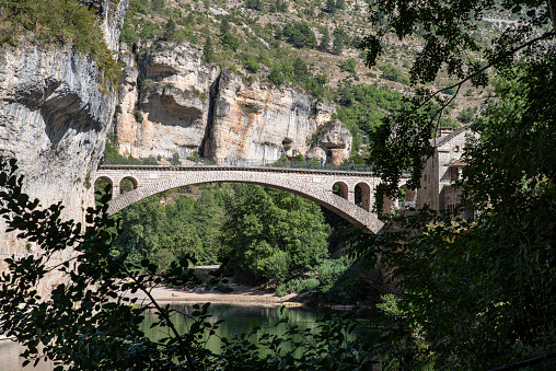 Village of Saint Chély du Tarn with its bridge in the Tarn Gorges in France