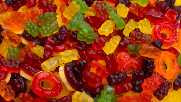 istock Assorted colorful gummy candies. Jelly donuts. Jelly bears. 1456863249
