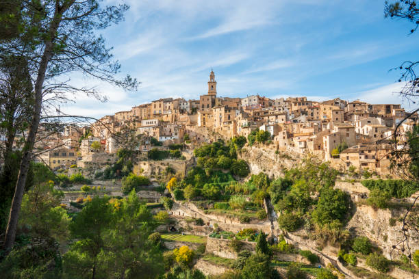 istock Panoramic image view to Bocairent village against rocky mountains and clear blue sky background. Comarca of Vall d`Albaida in Valencian Community, Spain 1456863927