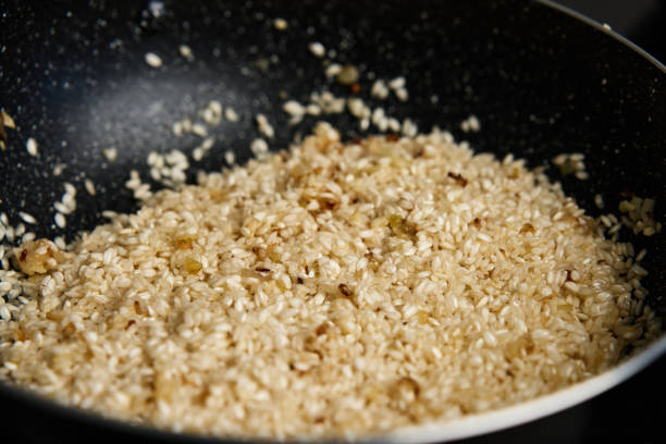 istock Process of cooking risotto in frying pan 1456865135