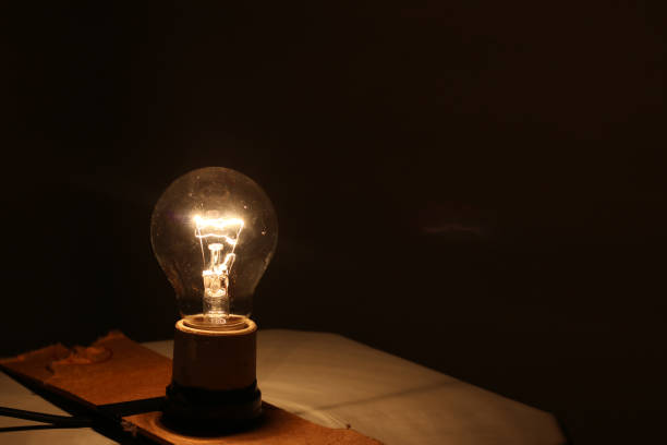 istock Yellow lamp lit in a room 1456866206