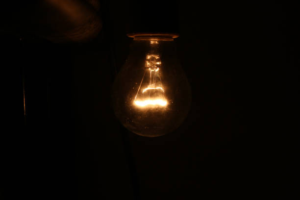istock Yellow lamp lit in a room 1456866219