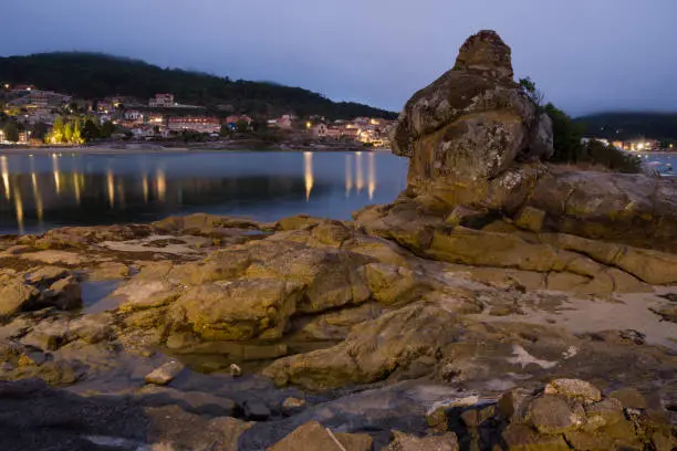 The Aldan Estuary cannot be considered estuary because it is not formed by the mouth of the river, but we can say that it is a deep entree of great beauty of the Pontevedra Estuary in Galicia Spain View by dusk.