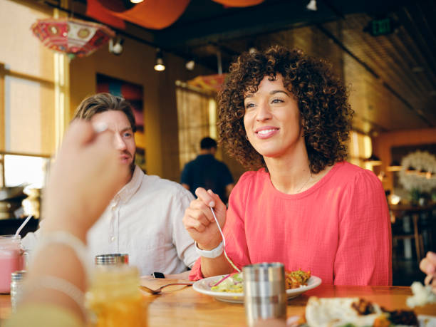 istock Group of Friends at an Indian Restaurant 1456875778