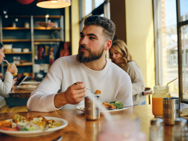istock Group of Friends at an Indian Restaurant 1456875992