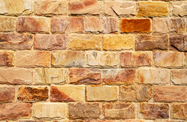 istock Wall of colored cracked bricks. Horizontal image. Advertising space. 1456876511