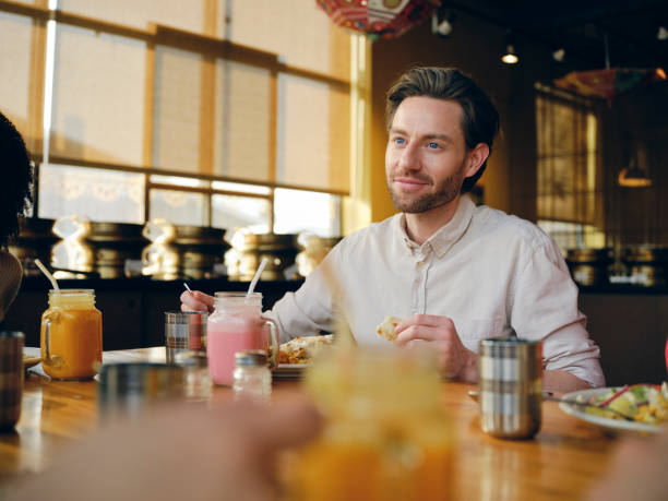 istock Group of Friends at an Indian Restaurant 1456878827