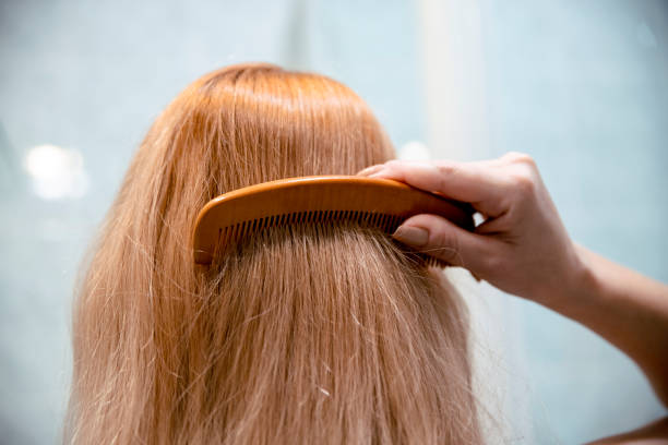 istock Brushing her long blonde hair 1456881015
