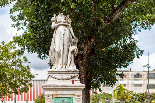 In 1859  a Carrara marble statue representing the Empress Josephine de Beauharnais, wife of  the French Emperor Napoleon 1, was  installed at La Savane Park in Fort de  France. In 1991, the statue was beheaded by a group of people and red paint was splattered on it as a reminder of her role in reinstating slavery.