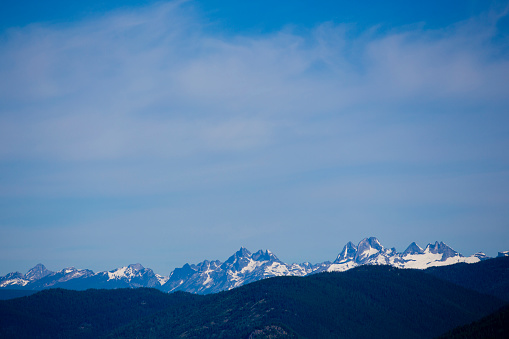 A view of the snowcapped mountains near Nelson, British Columbia, Canada in the summertime.