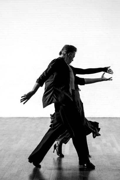 istock Beautiful couple dancing tango together 1456884630