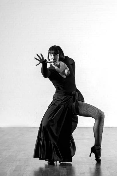 istock Beautiful elegant athletic woman dancing alone 1456884704