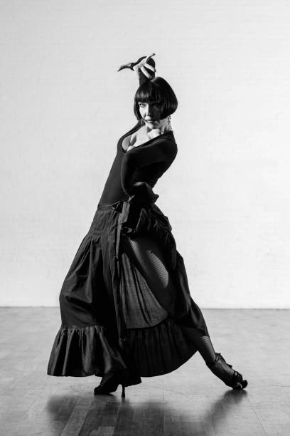 istock Beautiful elegant athletic woman dancing alone 1456884707