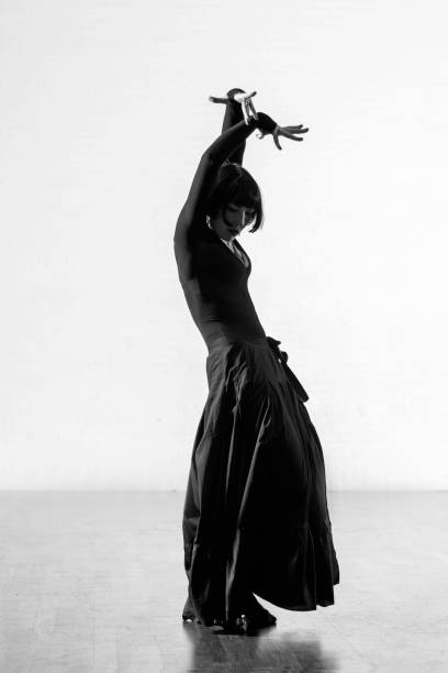 istock Beautiful elegant athletic woman dancing alone 1456884741