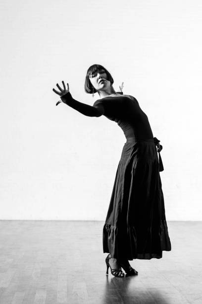 istock Beautiful elegant athletic woman dancing alone 1456884745