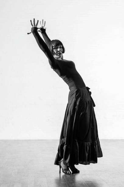 istock Beautiful elegant athletic woman dancing alone 1456884751