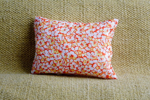 Cheerful cushion with floral pattern