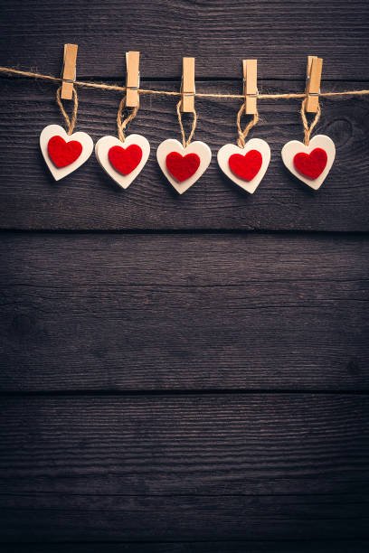 istock white red heart on the twine with clothespins 1456886382