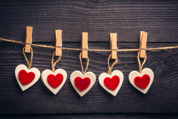 istock white red heart on the twine with clothespins 1456886499