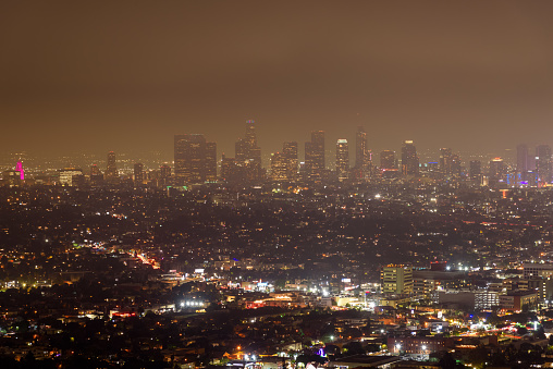 View of Los Angeles skyline on a foggy autumn night. California, USA.