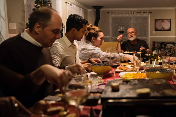 istock Family reunion for a Christmas holidays dinner. 1456894113