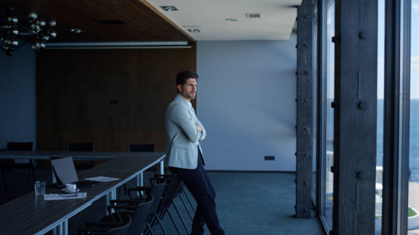 istock Worker resting luxury office conference room. Concerned client waiting lawyer 1456895247