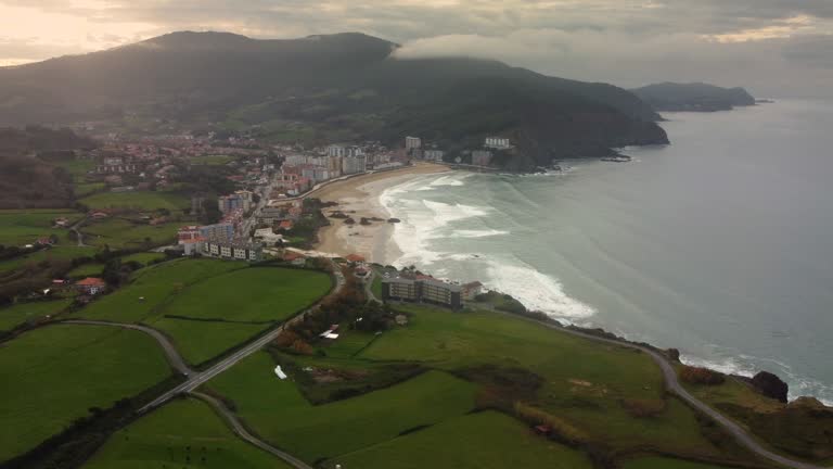 bilbao bizkaia país vasco drone footage filed green nature and mountains and cows and rivers plencia beach