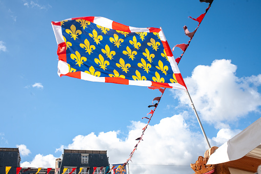 Orleans, France - September 21, 2020: Medieval flag at market  during medieval Festival de Loire.