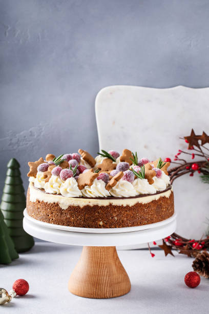 istock Christmas cake decorated with gingerbread cookies and sugared cranberry 1456907192