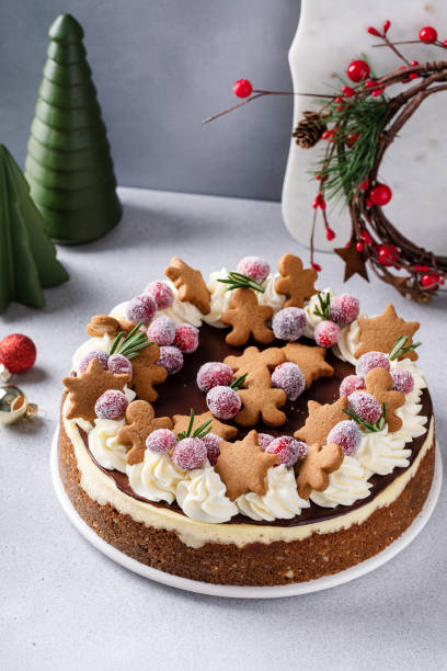 istock Christmas cake decorated with gingerbread cookies and sugared cranberry 1456907237