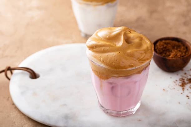 istock Strawberry dalgona whipped coffee in a glass with ice 1456907506