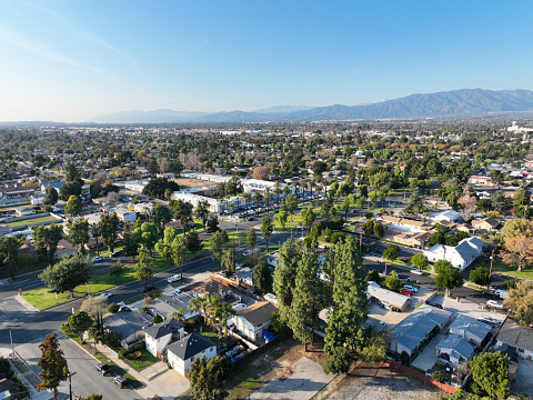 Aerial view of Ontario city in California with mountains in the background
