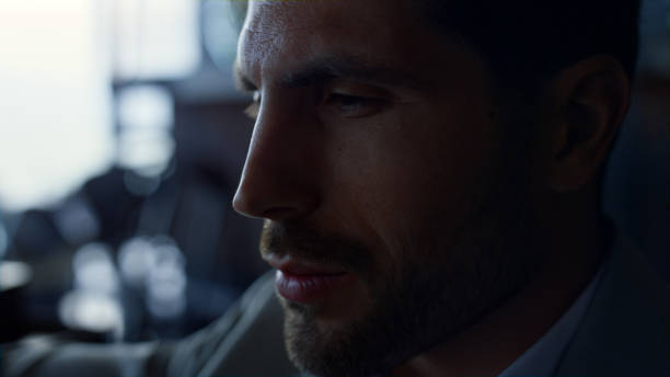 istock Businessman portrait thinking alone closeup. Director pondering about problem 1456912933