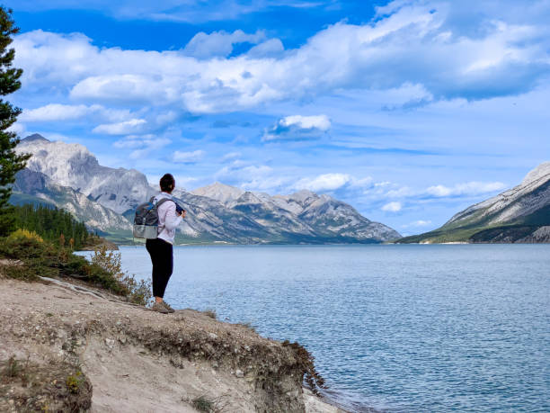 istock Woman Overlooking a lake 1456914449