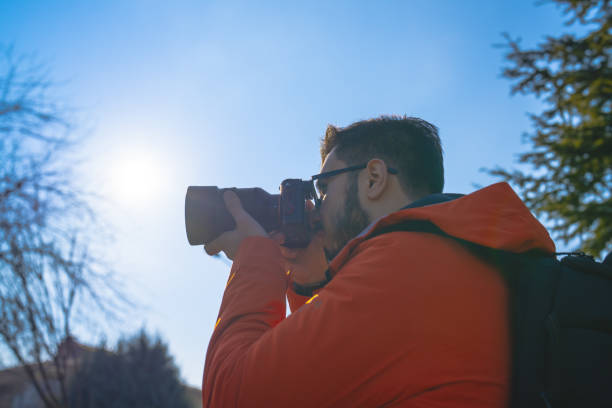 istock Photographer taking photo in nature 1456923010