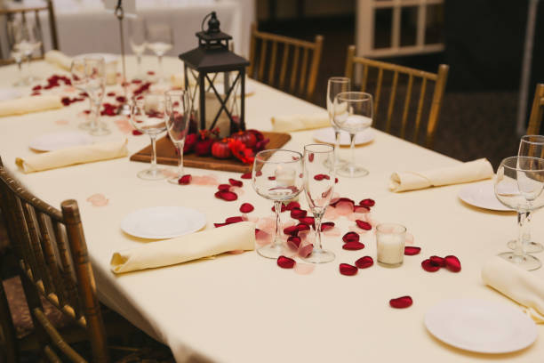 istock wedding venue tables flowers alcohol reception celebration candles 1456928685