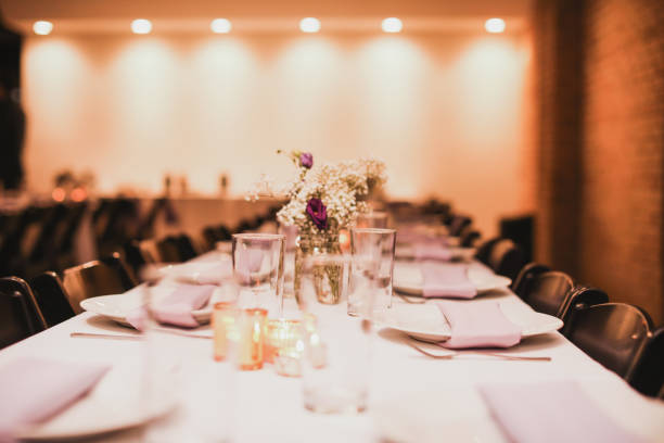 istock wedding venue tables flowers alcohol reception celebration candles 1456928928
