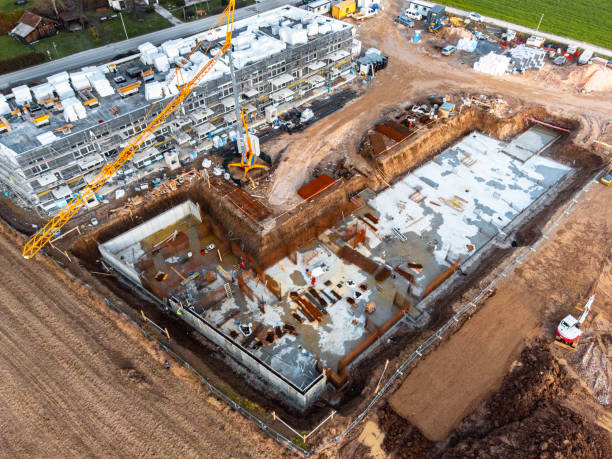 istock Two new apartment buildings under construction aerial view 1456928976