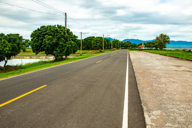 istock Road and running track beside Kwan Phayao lake 1456929037