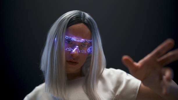 istock Metaverse woman hand touching invisible videogame world closeup. Future concept 1456930155