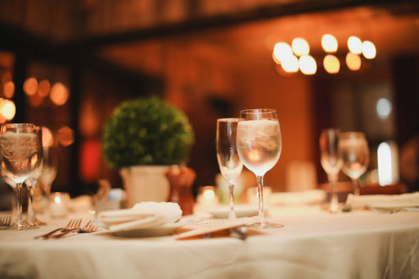 istock wedding venue tables flowers alcohol reception celebration candles 1456931923