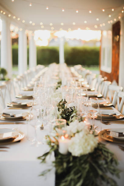 istock wedding venue tables flowers alcohol reception celebration candles 1456932391