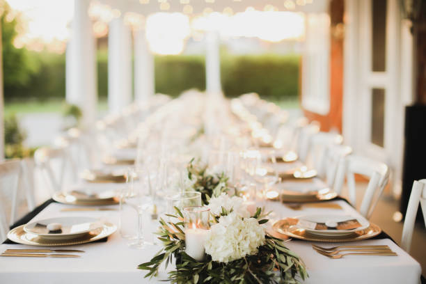 istock wedding venue tables flowers alcohol reception celebration candles 1456932419