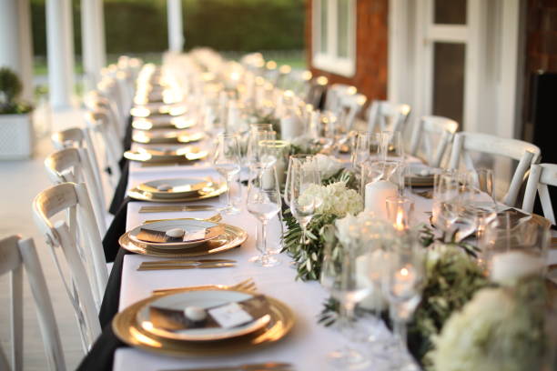 istock wedding venue tables flowers alcohol reception celebration candles 1456932444