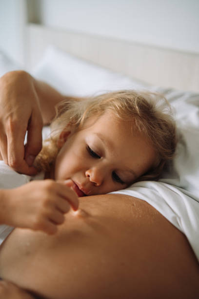 istock Mother and a daughter playing together 1456933863