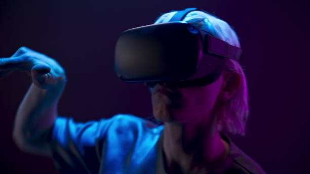 istock Metaverse man VR glasses playing videogame closeup. Youngster analyzing 3d world 1456934468