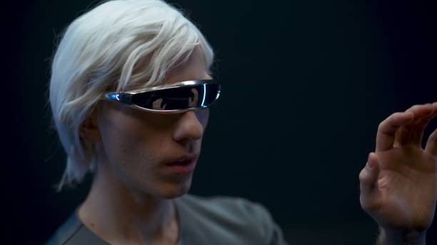 istock Digital glasses man travelling metaverse outer space. Gamer gesturing touching 1456936501