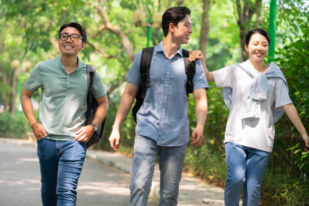 istock Photo of group Asian student outside 1456949707